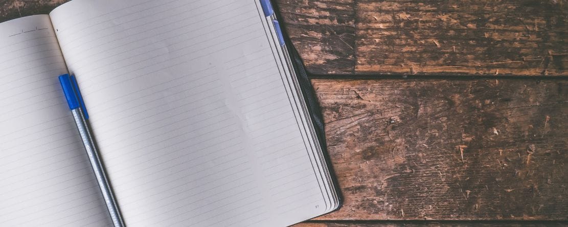 Ballpen book on desk