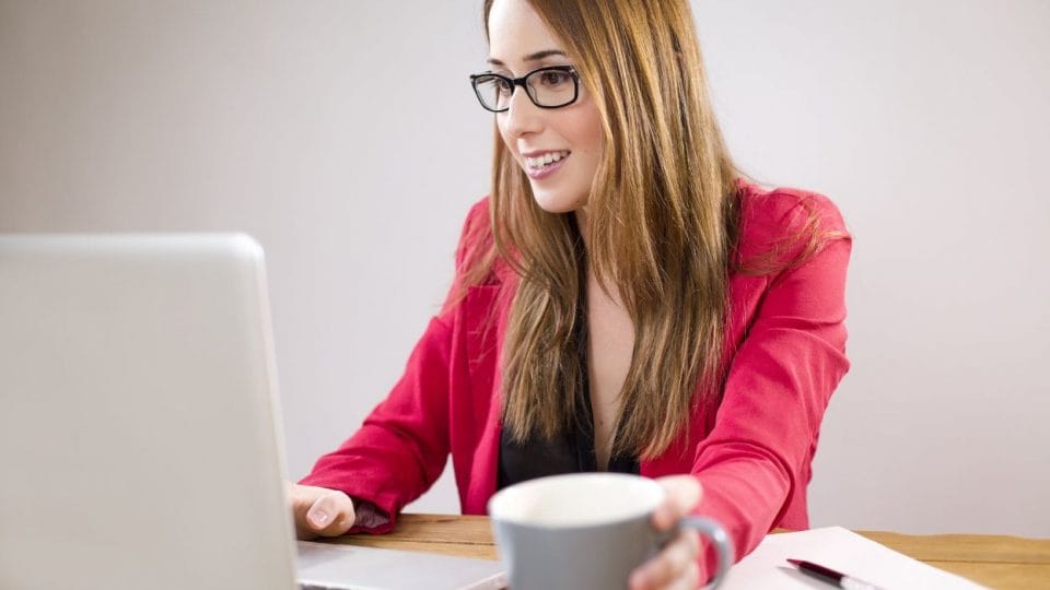 Woman Working On Her Pc Things To Do When You Turn 18 (1)