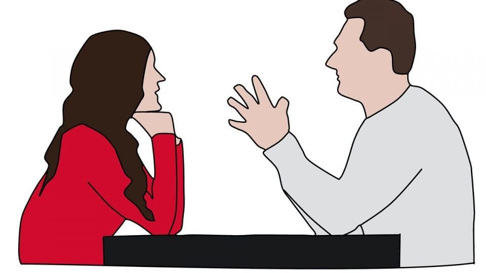 Man And Woman Talking With Each Other