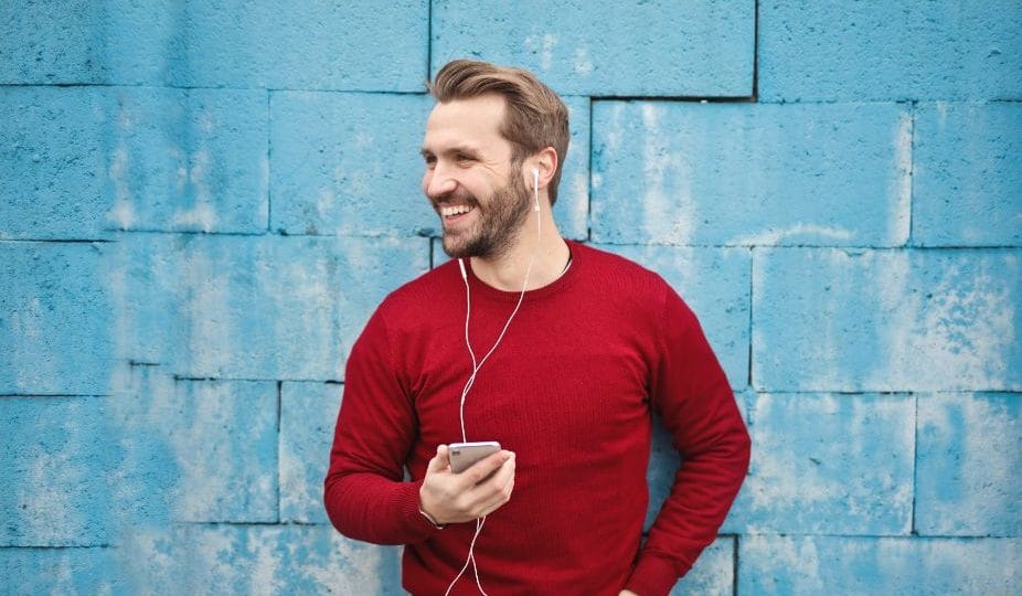 A Man Wearing a red T-shirt Smiling Be More Confident