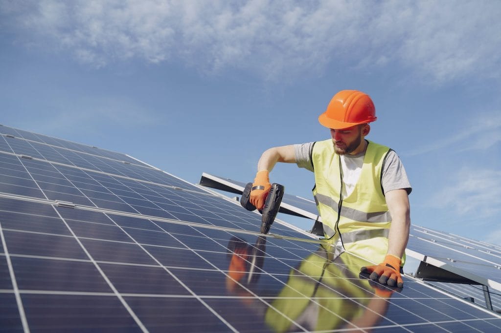 How does a grid tied, solar inverter work