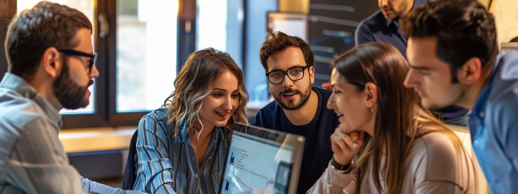 F1b5b46e c7e5 49f2 965f e3116bca050d A group of professionals gathered around a computer, reading and discussing online reviews of a commercial ac repair service in el paso.